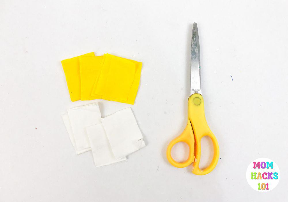 Cutting crepe paper for paper plate fish craft
